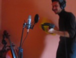 MM recording the tambourine using a feather duster.